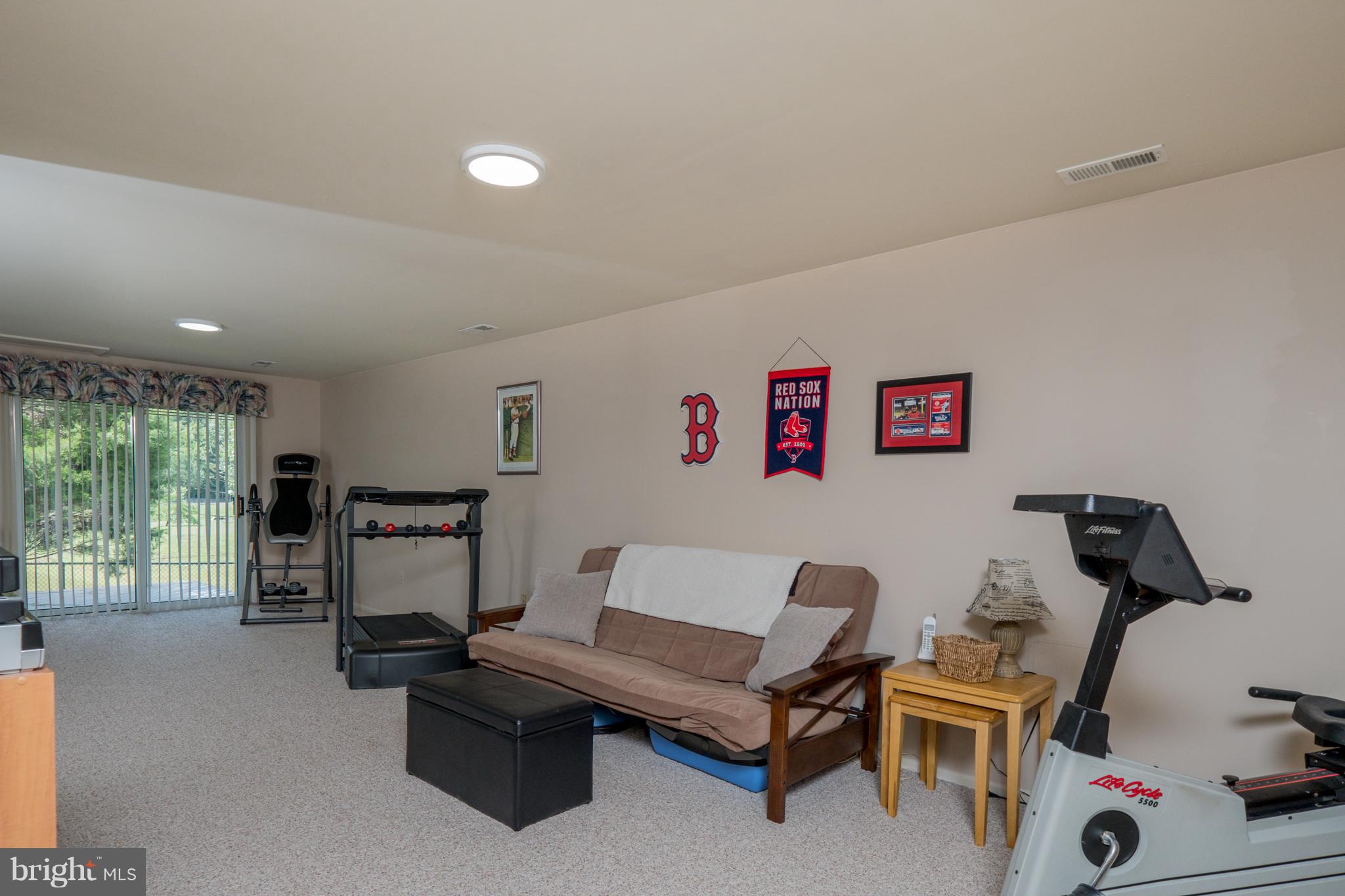 844 Sunny Chapel Road Odenton, MD 21113 - Photo 22 of 29 a living room with furniture and a window