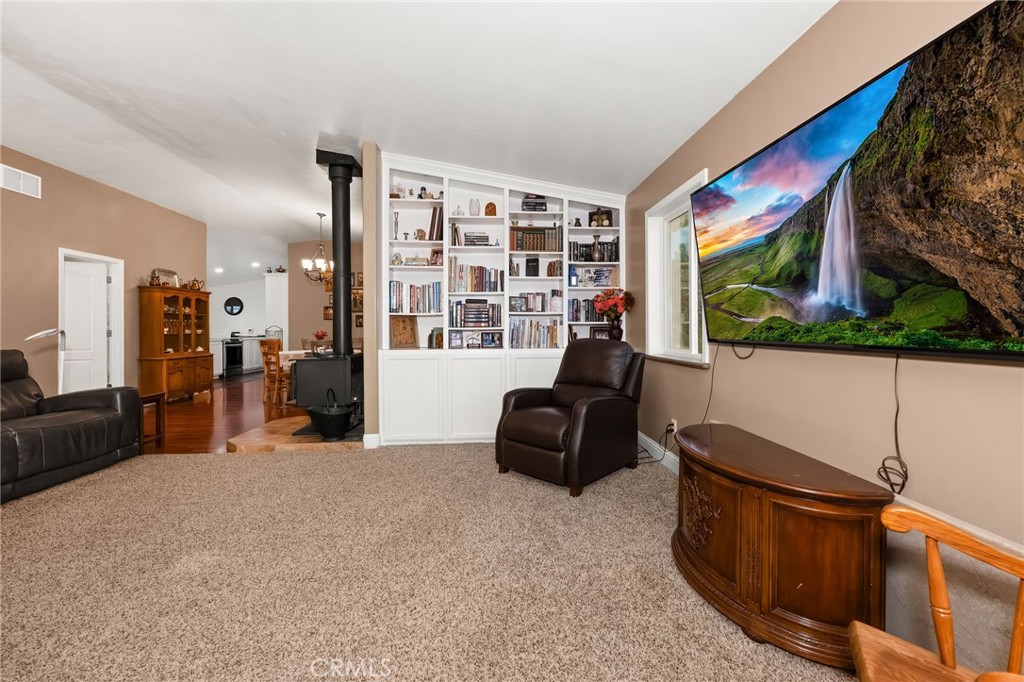 2728 Pentz Road Oroville, CA 95965 - Photo 16 of 52 a living room with furniture and a flat screen tv