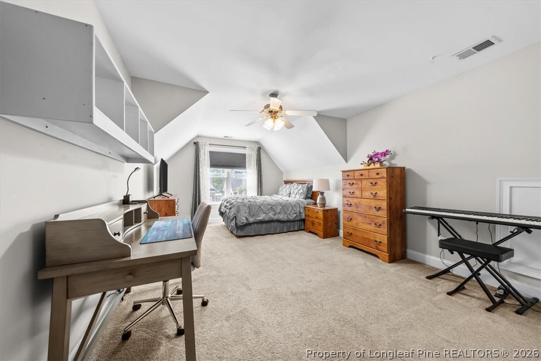 2708 Plum Ridge Road Fayetteville, NC 28306 - Photo 21 of 27 a bedroom with furniture and a window