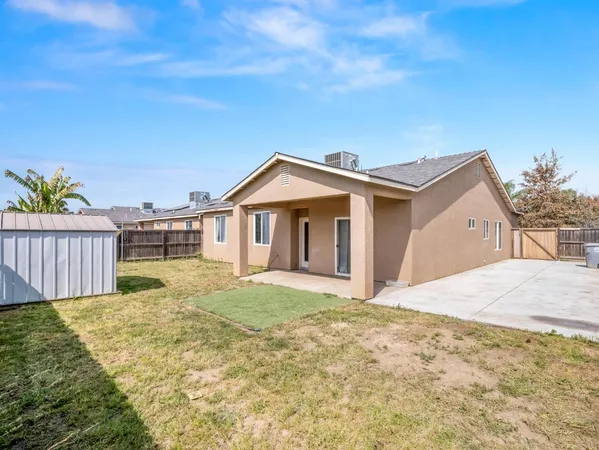 a house with yard in front of it