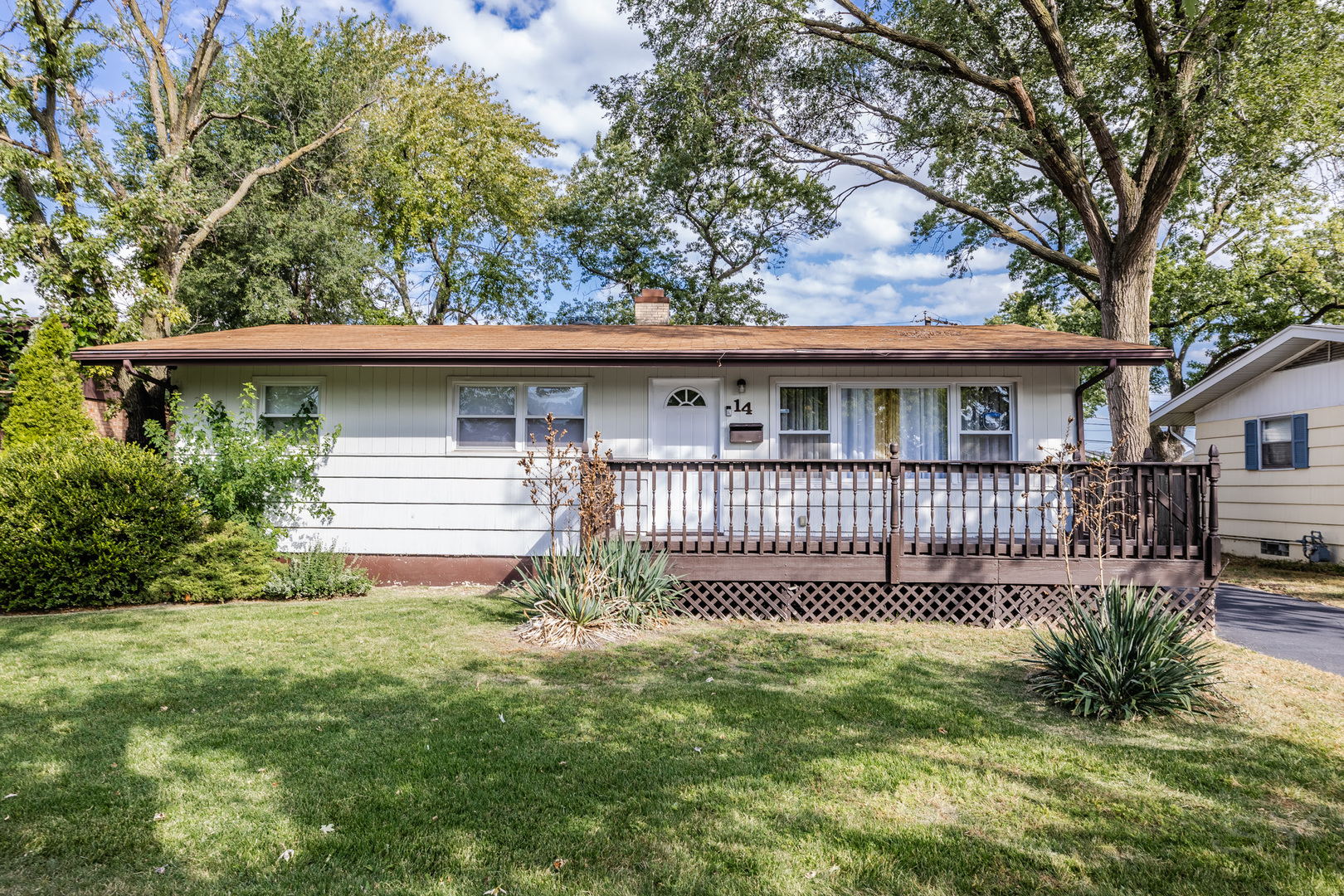 14 Arrowhead Drive Thornton, IL 60476 - Photo 1 of 26 a view of a house with a small yard and a large tree