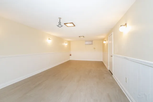 a room with table and chairs