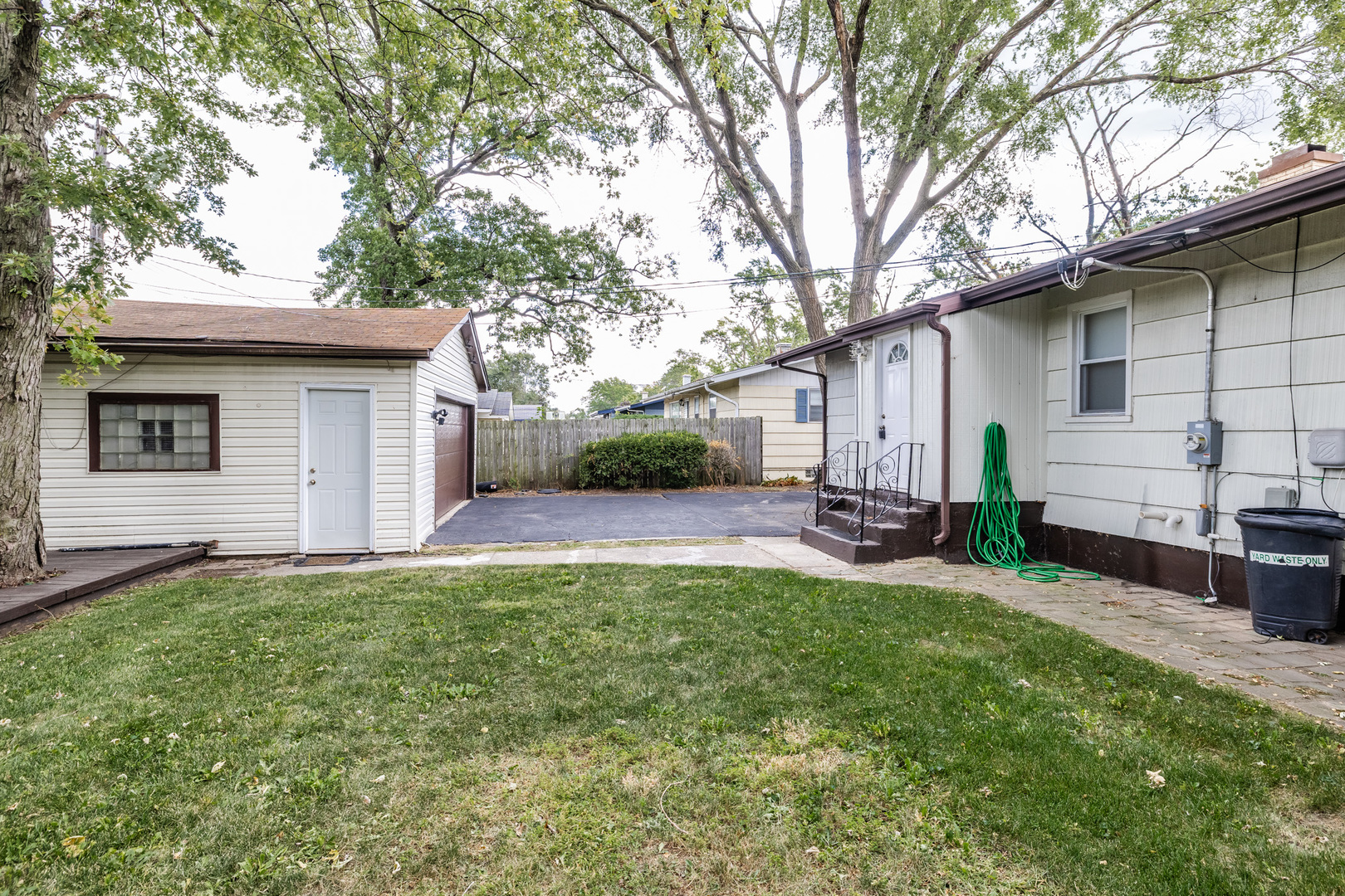 14 Arrowhead Drive Thornton, IL 60476 - Photo 26 of 26 a view of a yard with a house and a large tree