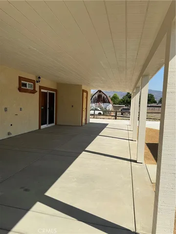 a living room with a wooden floor