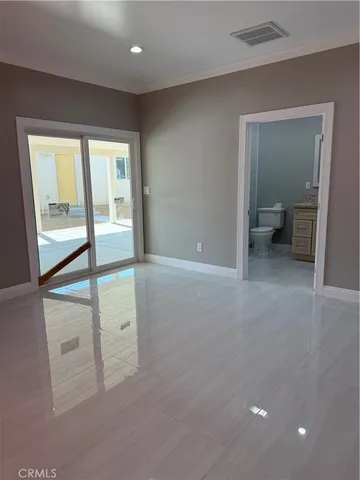 wooden floor and windows in a room