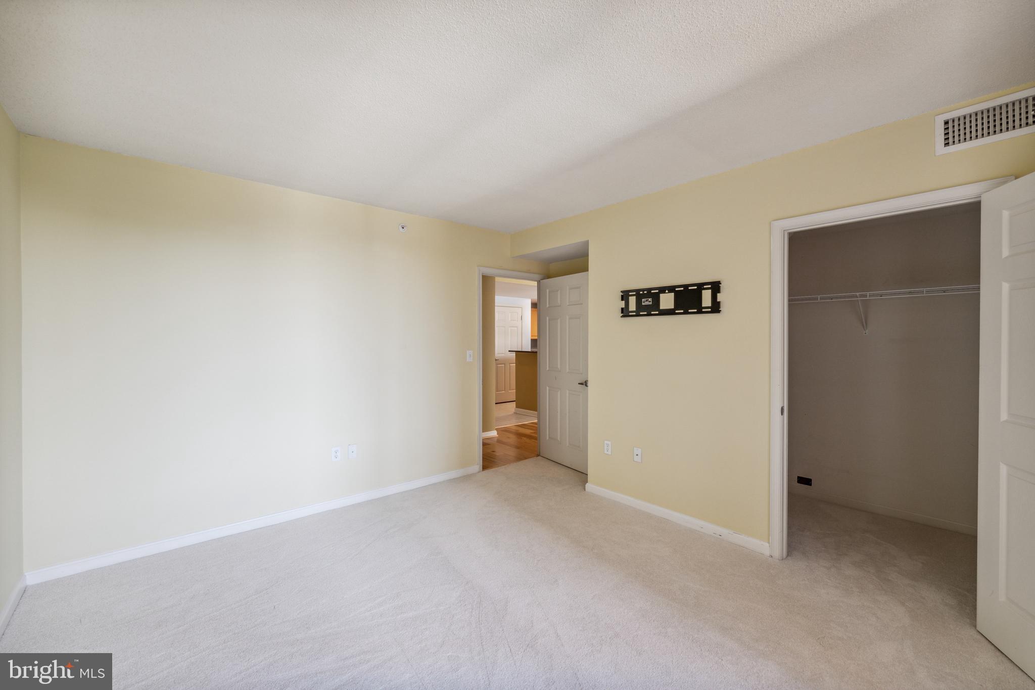 2726 Gallows Road, Unit 412 Vienna, VA 22180 - Photo 17 of 38 Primary Bedroom w/ Walk in closet