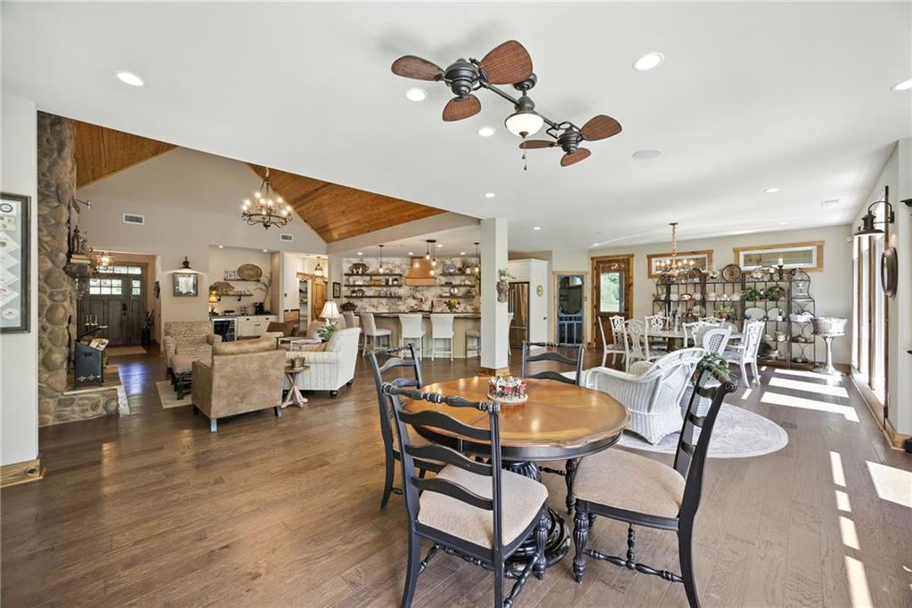 1620 Pond Fork Church Road Talmo, GA 30575 - Photo 16 of 73 a dining room with livingroom view and wooden floor