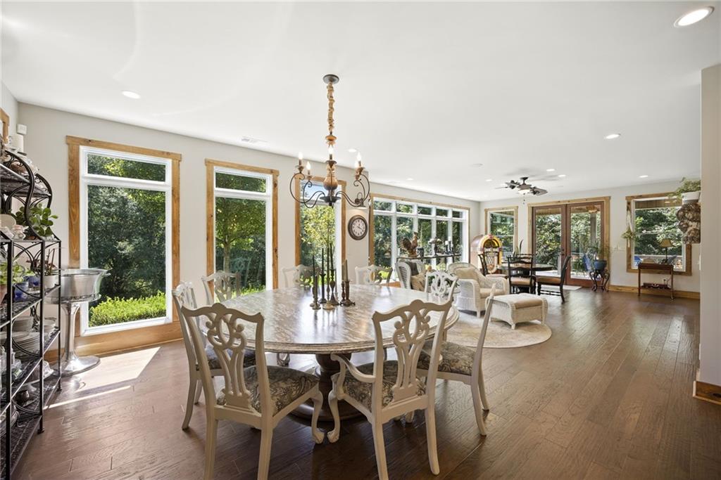 1620 Pond Fork Church Road Talmo, GA 30575 - Photo 21 of 73 a view of a dining room with furniture window and wooden floor