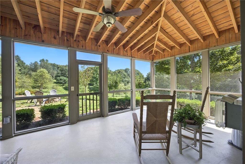 1620 Pond Fork Church Road Talmo, GA 30575 - Photo 25 of 73 a patio with yard glass top table and chairs