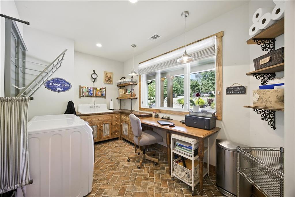 1620 Pond Fork Church Road Talmo, GA 30575 - Photo 29 of 73 a room with furniture a rug and a window