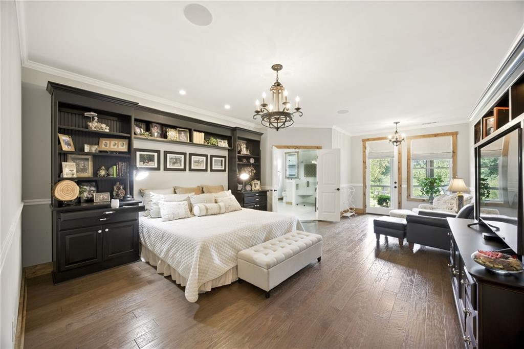 1620 Pond Fork Church Road Talmo, GA 30575 - Photo 30 of 73 a bedroom with a bed and wooden floor