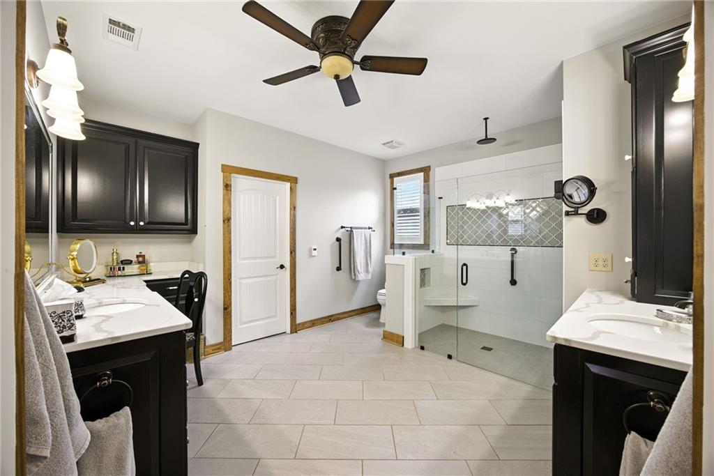 1620 Pond Fork Church Road Talmo, GA 30575 - Photo 33 of 73 a spacious bathroom with a sink a mirror and a shower