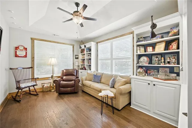 a swimming pool with trees in the background