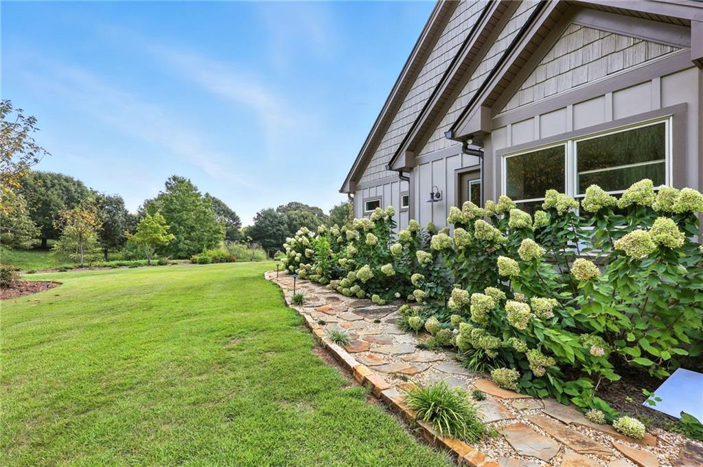 1620 Pond Fork Church Road Talmo, GA 30575 - Photo 50 of 73 a house view with a garden space