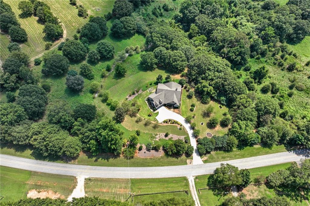 1620 Pond Fork Church Road Talmo, GA 30575 - Photo 5 of 73 an aerial view of residential house with outdoor space and trees all around