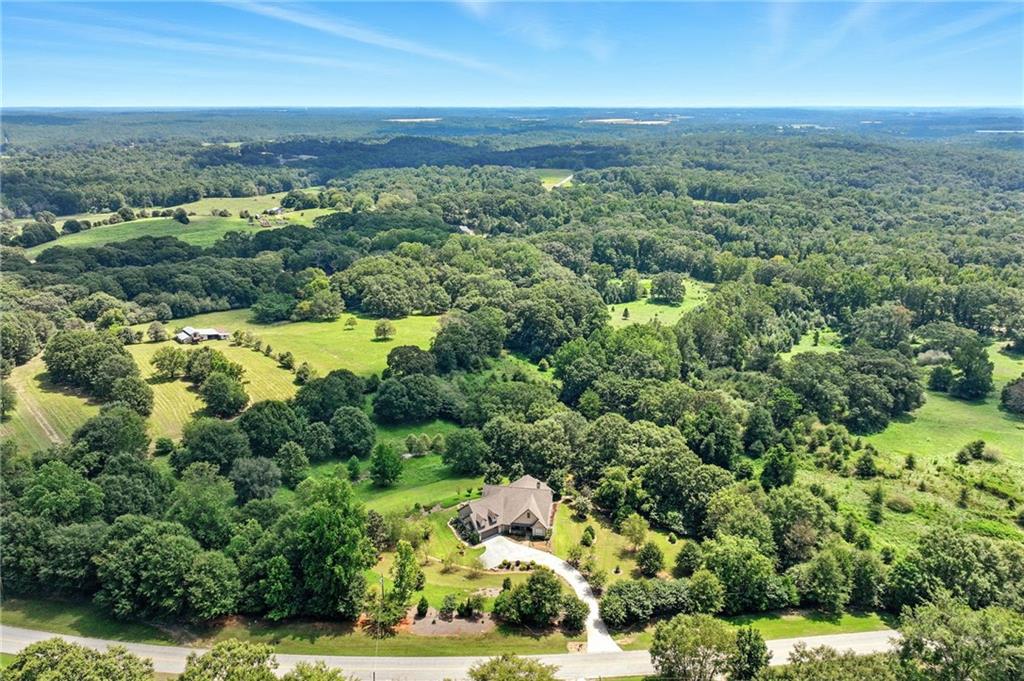 1620 Pond Fork Church Road Talmo, GA 30575 - Photo 62 of 73 an aerial view of a house with a yard