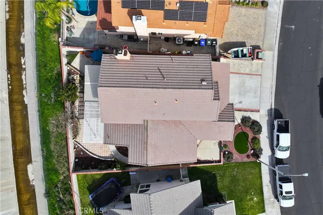 an aerial view of a house with a garden