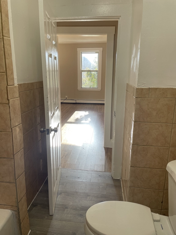 18 Lawton Avenue, Unit 3 Lynn, MA 01902 - Photo 14 of 24 a bathroom with a toilet and a shower