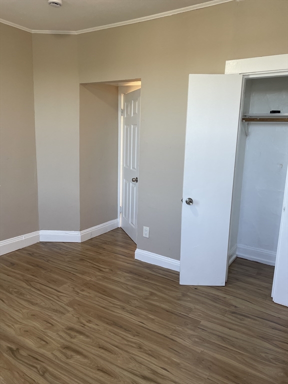 18 Lawton Avenue, Unit 3 Lynn, MA 01902 - Photo 19 of 24 a view of wooden floor and closet in a room