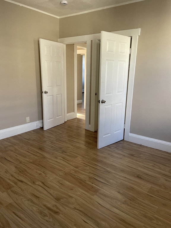 18 Lawton Avenue, Unit 3 Lynn, MA 01902 - Photo 5 of 24 a view of wooden floor in an empty room