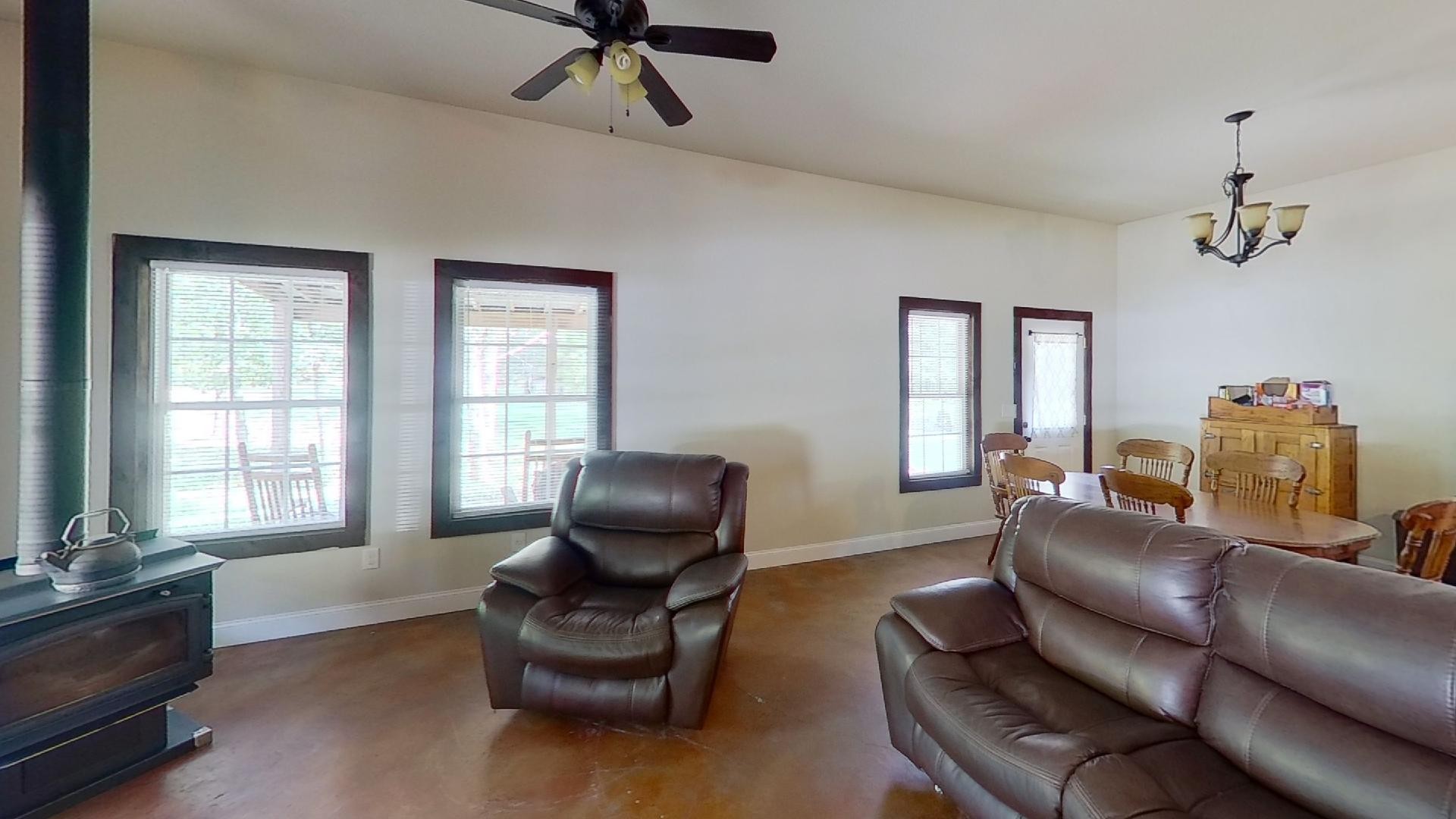 2314 Joe Brown Road Spring Hill, TN 37174 - Photo 22 of 28 a living room with furniture ceiling fan and a window