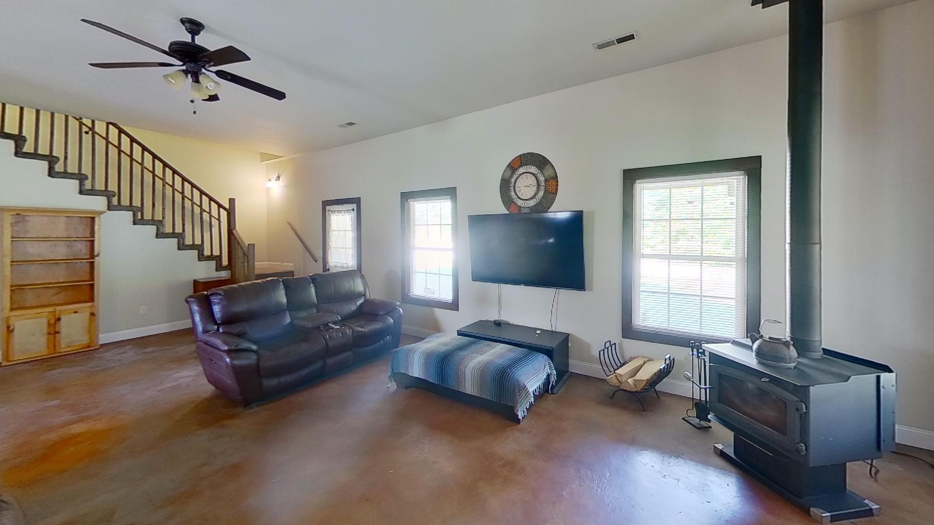 2314 Joe Brown Road Spring Hill, TN 37174 - Photo 23 of 28 a living room with furniture and a window