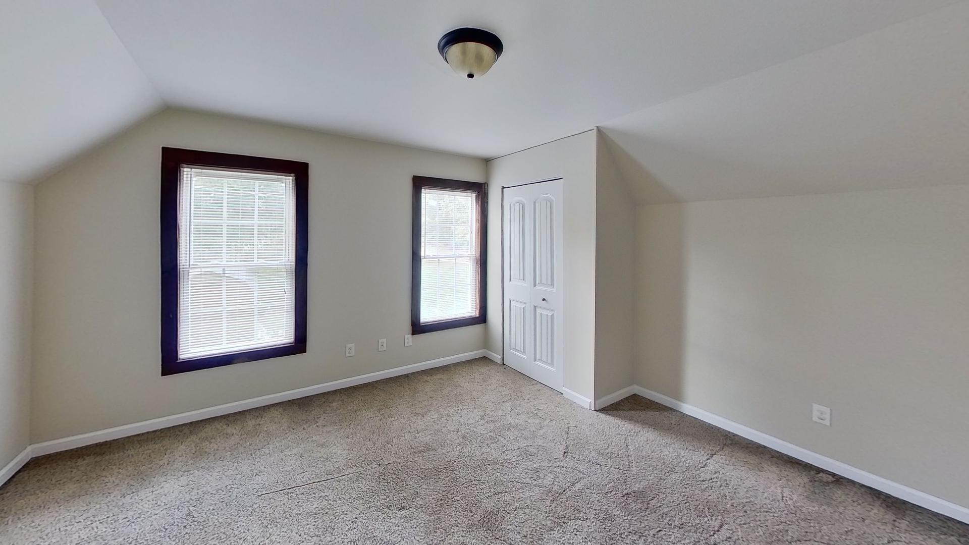 2314 Joe Brown Road Spring Hill, TN 37174 - Photo 25 of 28 a view of an empty room with a window