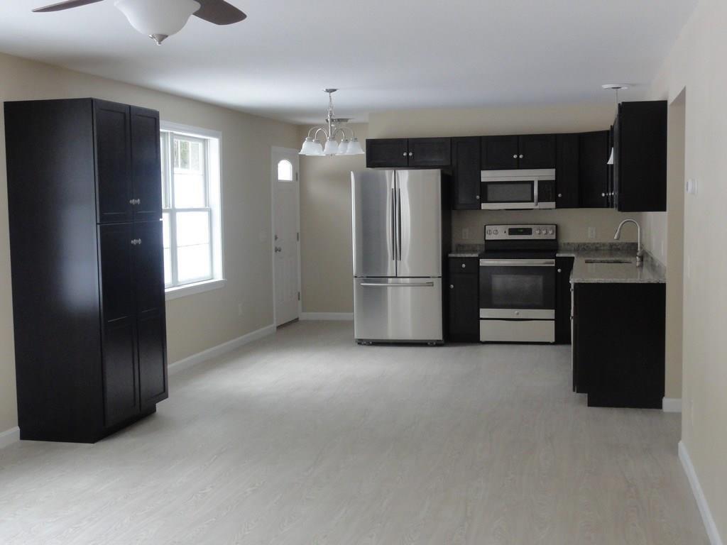 9 West Road Belgrade, ME 04917 - Photo 3 of 16 Large pantry cabinet for plenty of...
