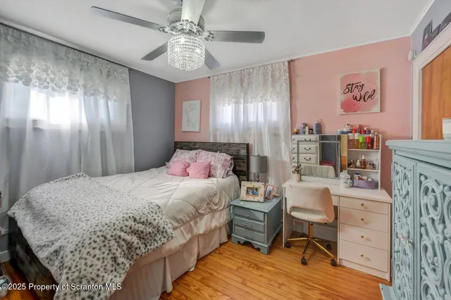 a bedroom with a bed and furniture