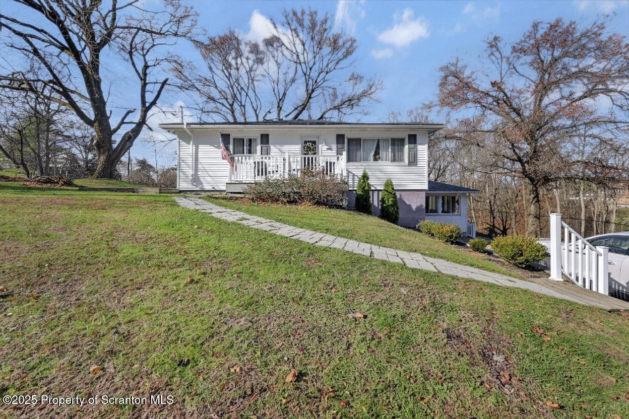 101 Miller Road Clarks Summit, PA 18411 - Photo 2 of 51 a view of a yard in front of house