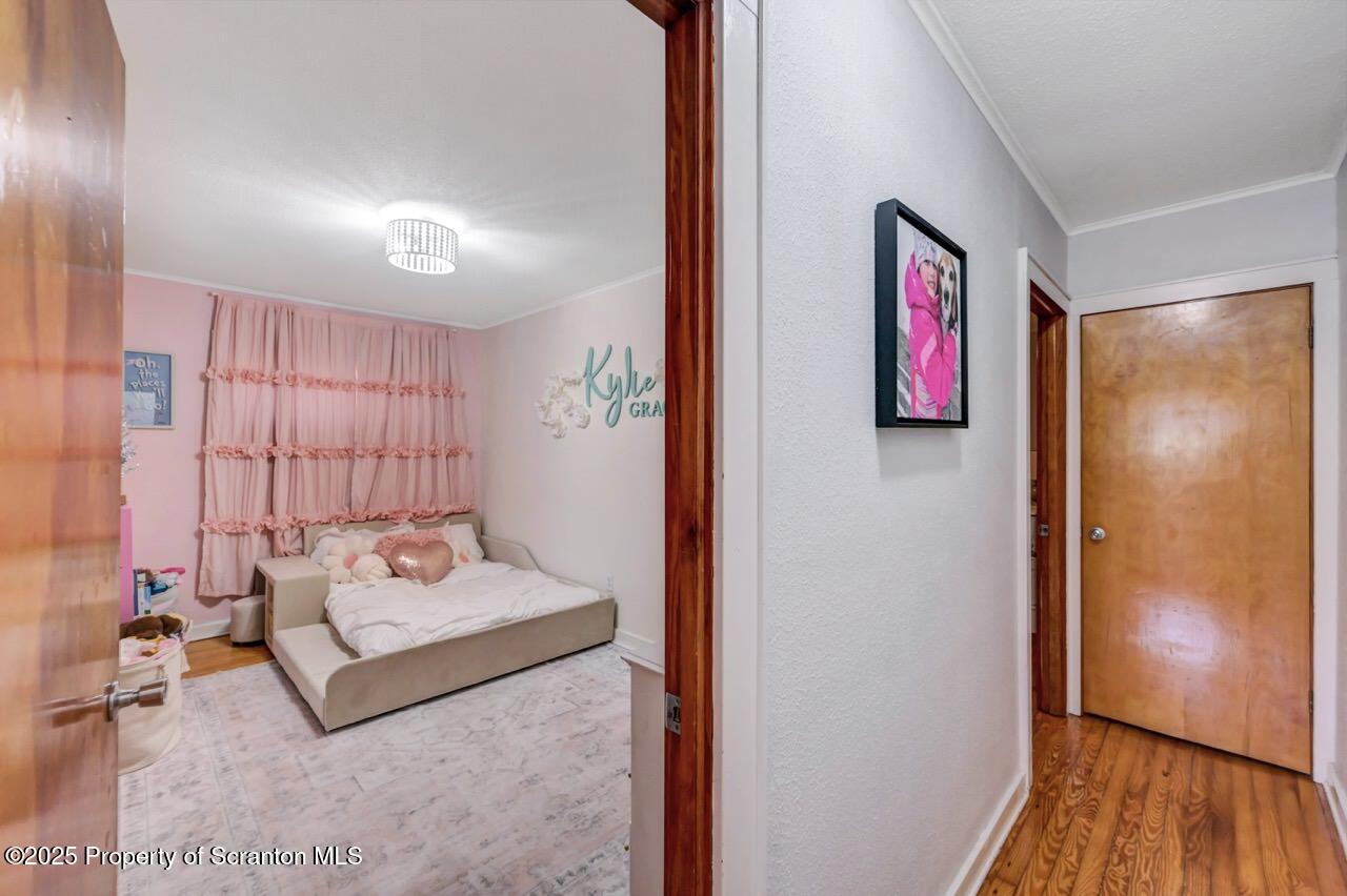 101 Miller Road Clarks Summit, PA 18411 - Photo 21 of 51 a bedroom with furniture and a window