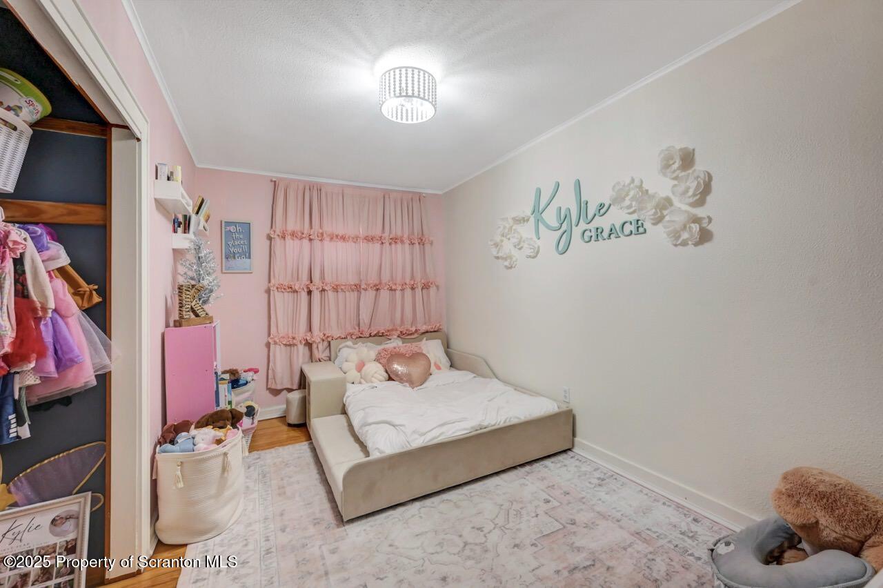 101 Miller Road Clarks Summit, PA 18411 - Photo 22 of 51 a bedroom with a bed and a window