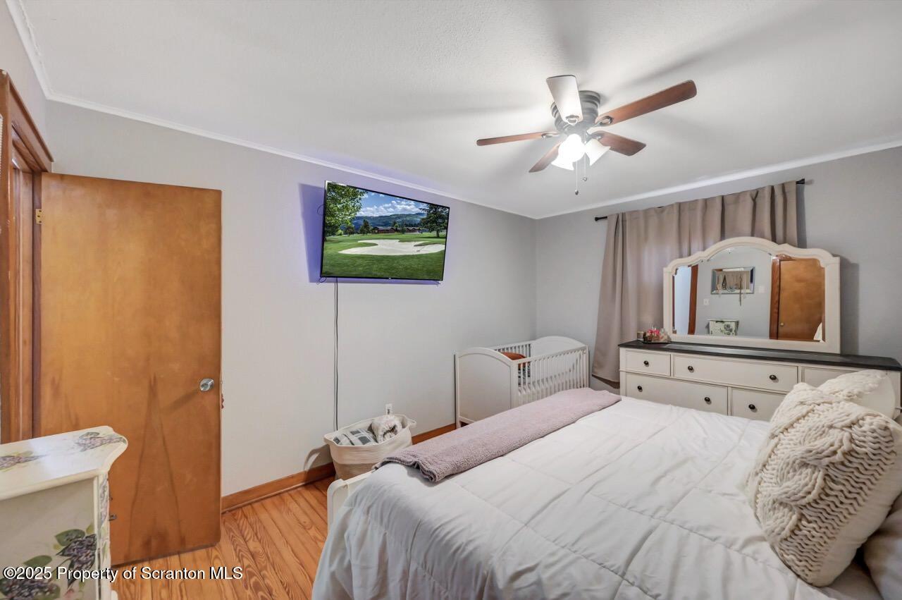 101 Miller Road Clarks Summit, PA 18411 - Photo 27 of 51 a bedroom with a bed and a flat screen tv