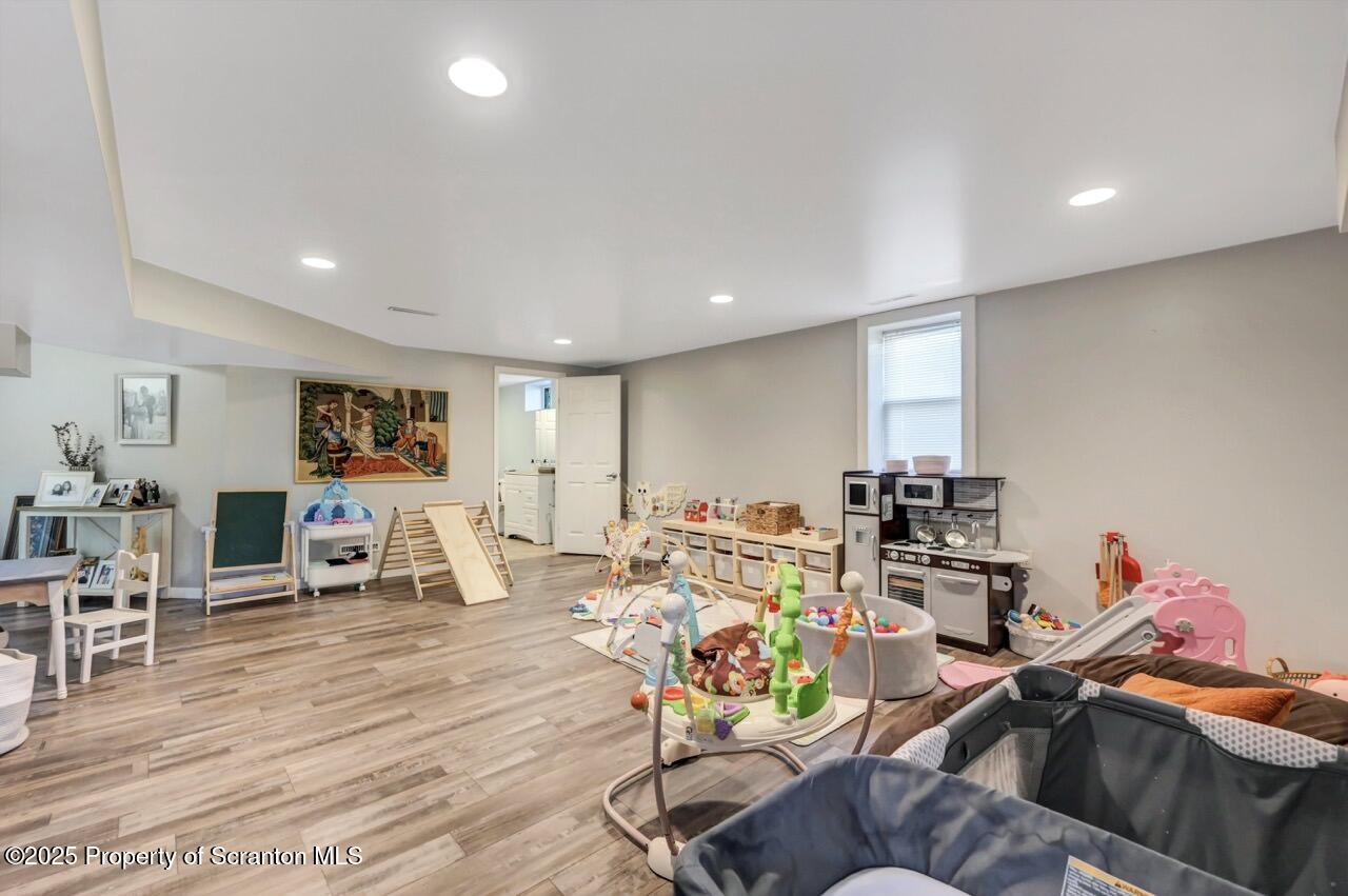 101 Miller Road Clarks Summit, PA 18411 - Photo 29 of 51 a view of a workspace with furniture and a living room