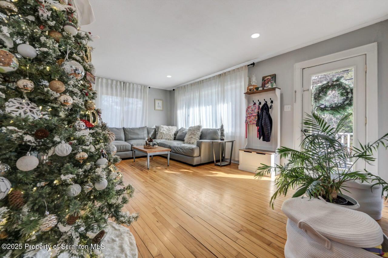 101 Miller Road Clarks Summit, PA 18411 - Photo 4 of 51 a living room with furniture and a potted plant
