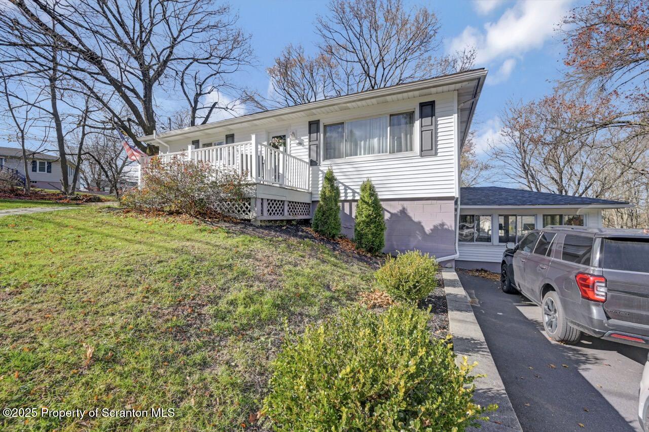 101 Miller Road Clarks Summit, PA 18411 - Photo 41 of 51 a front view of house with yard and green space