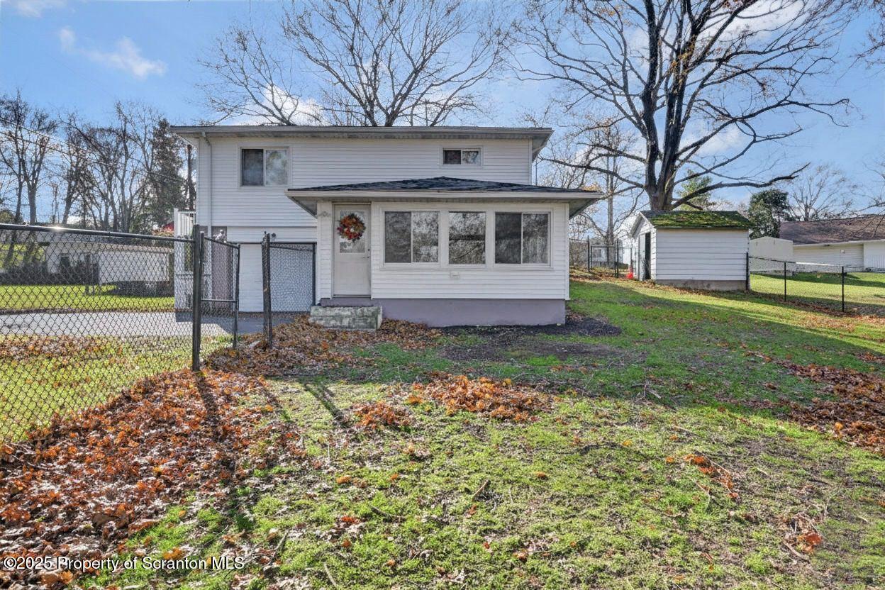 101 Miller Road Clarks Summit, PA 18411 - Photo 42 of 51 a front view of a house with garden