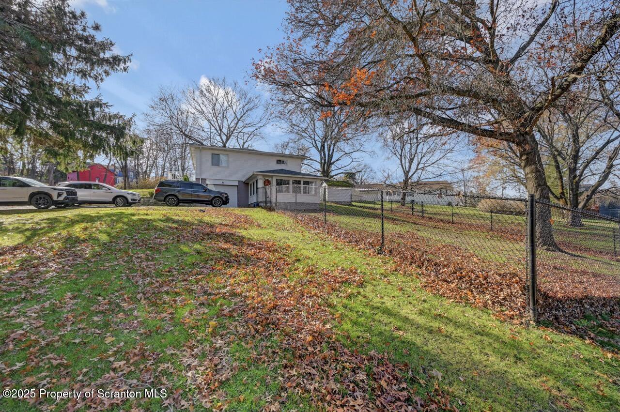 101 Miller Road Clarks Summit, PA 18411 - Photo 44 of 51 a view of a house with pool and a yard