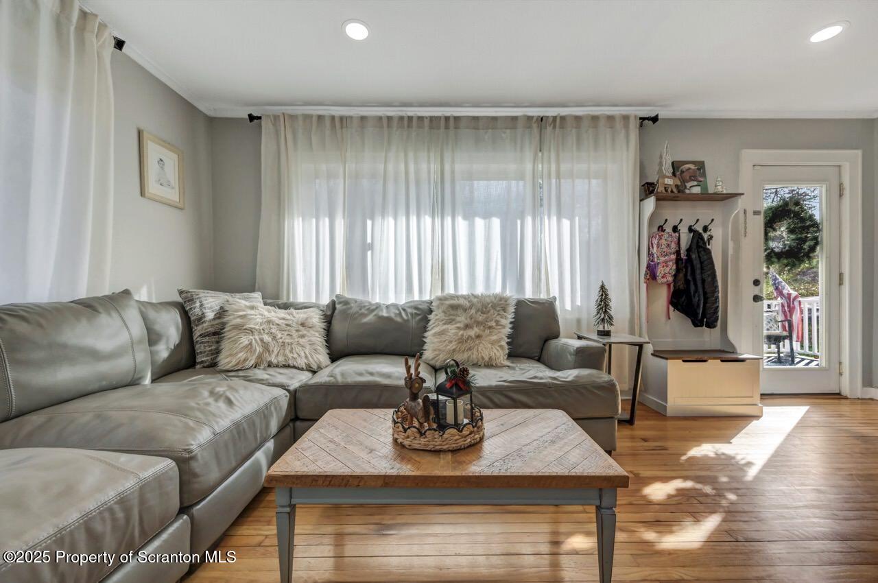 101 Miller Road Clarks Summit, PA 18411 - Photo 8 of 51 a living room with furniture and a flat screen tv