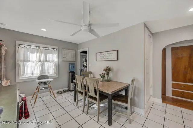 a view of a livingroom with furniture and window