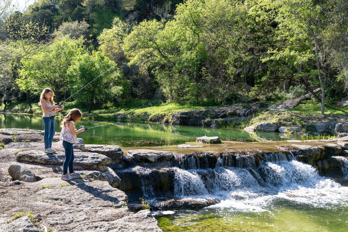 a view of a lake with a park