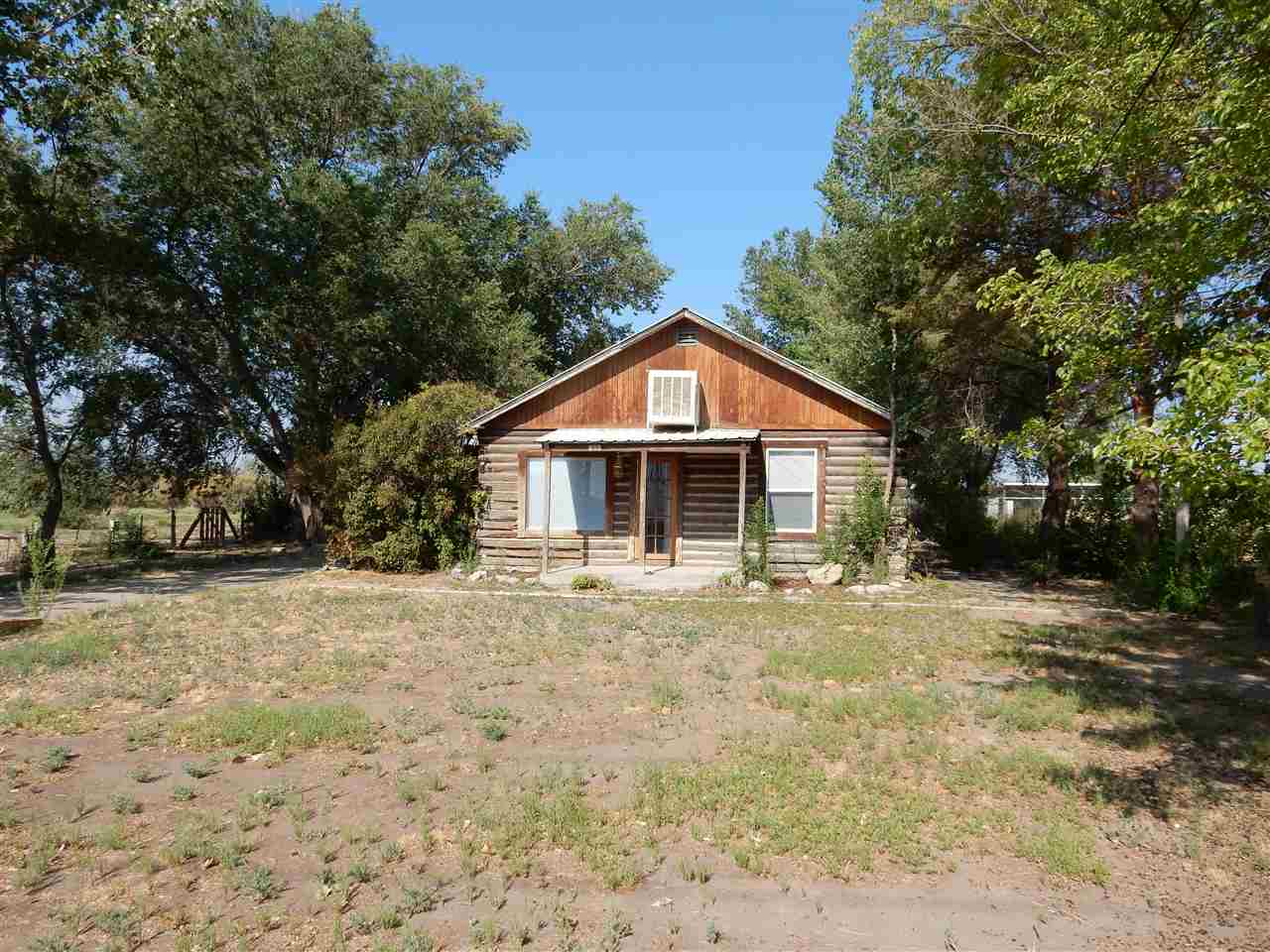 689 35 Road Clifton, CO 81520 - Photo 1 of 1 a front view of a house with a yard
