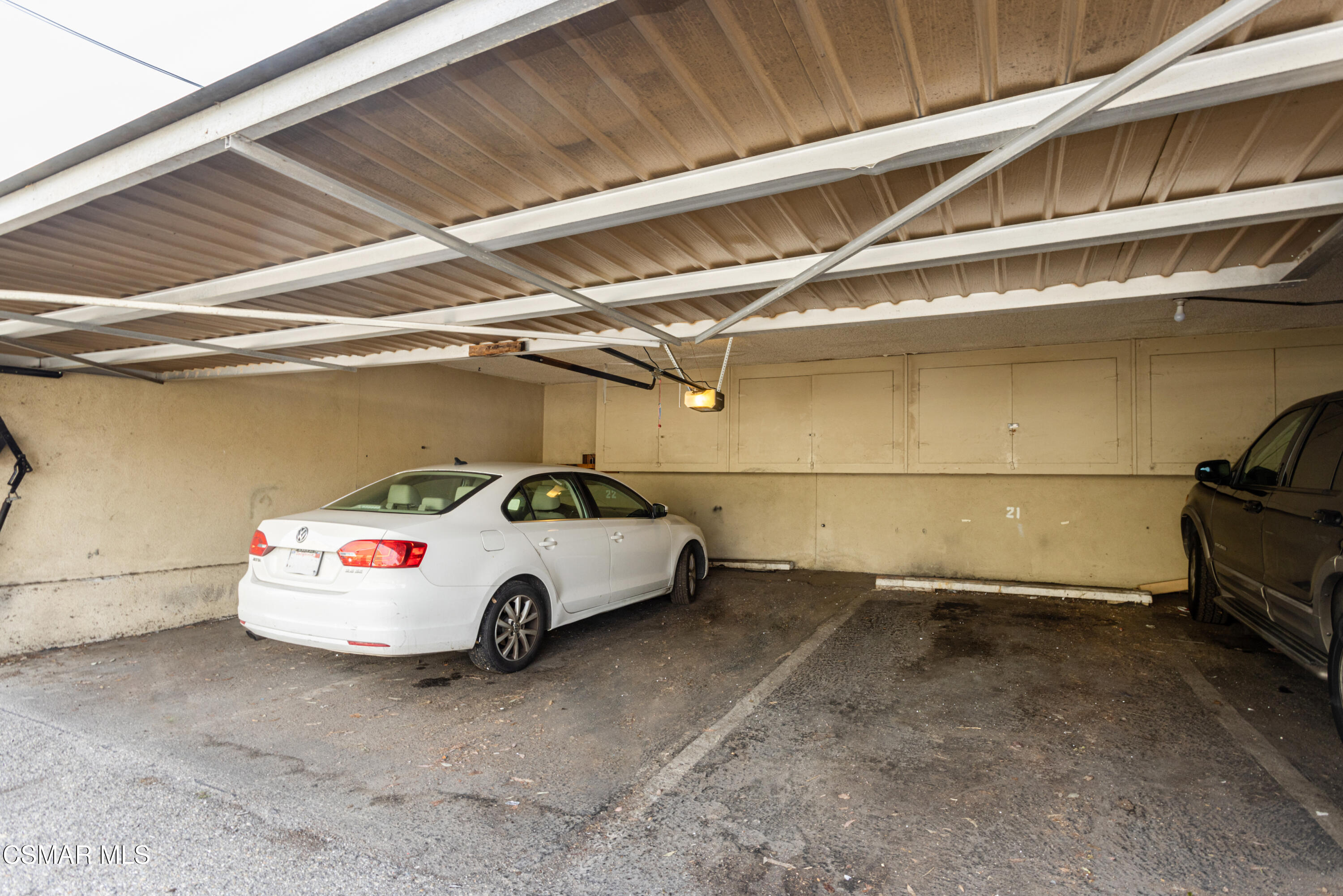 1337 Edgewood Way, Unit 37 Oxnard, CA 93030 - Photo 12 of 13 a white car parked in a parking