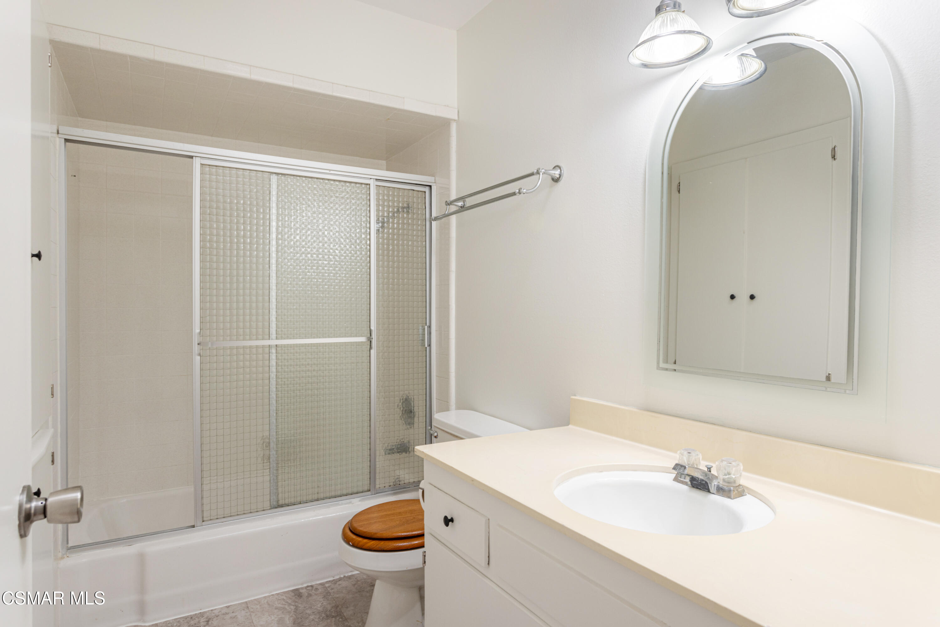 1337 Edgewood Way, Unit 37 Oxnard, CA 93030 - Photo 10 of 13 a bathroom with a sink toilet and shower