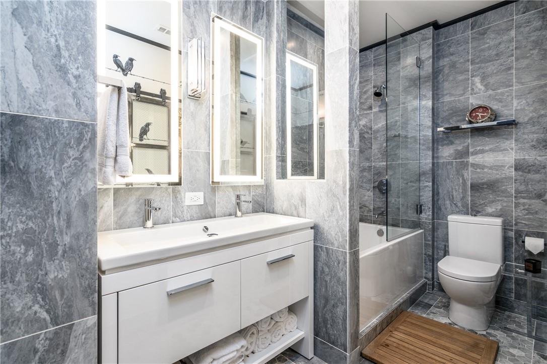 866 Cherokee Road Charlotte, NC 28207 - Photo 28 of 35 a bathroom with a sink and a toilet