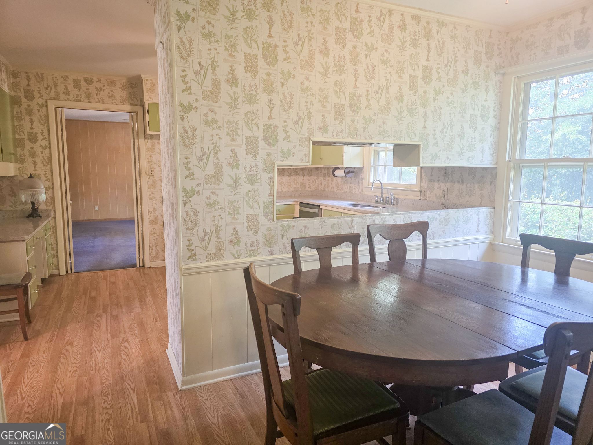 1712 Briarcliff Road Milledgeville, GA 31061 - Photo 18 of 44 a dining room with furniture and wooden floor