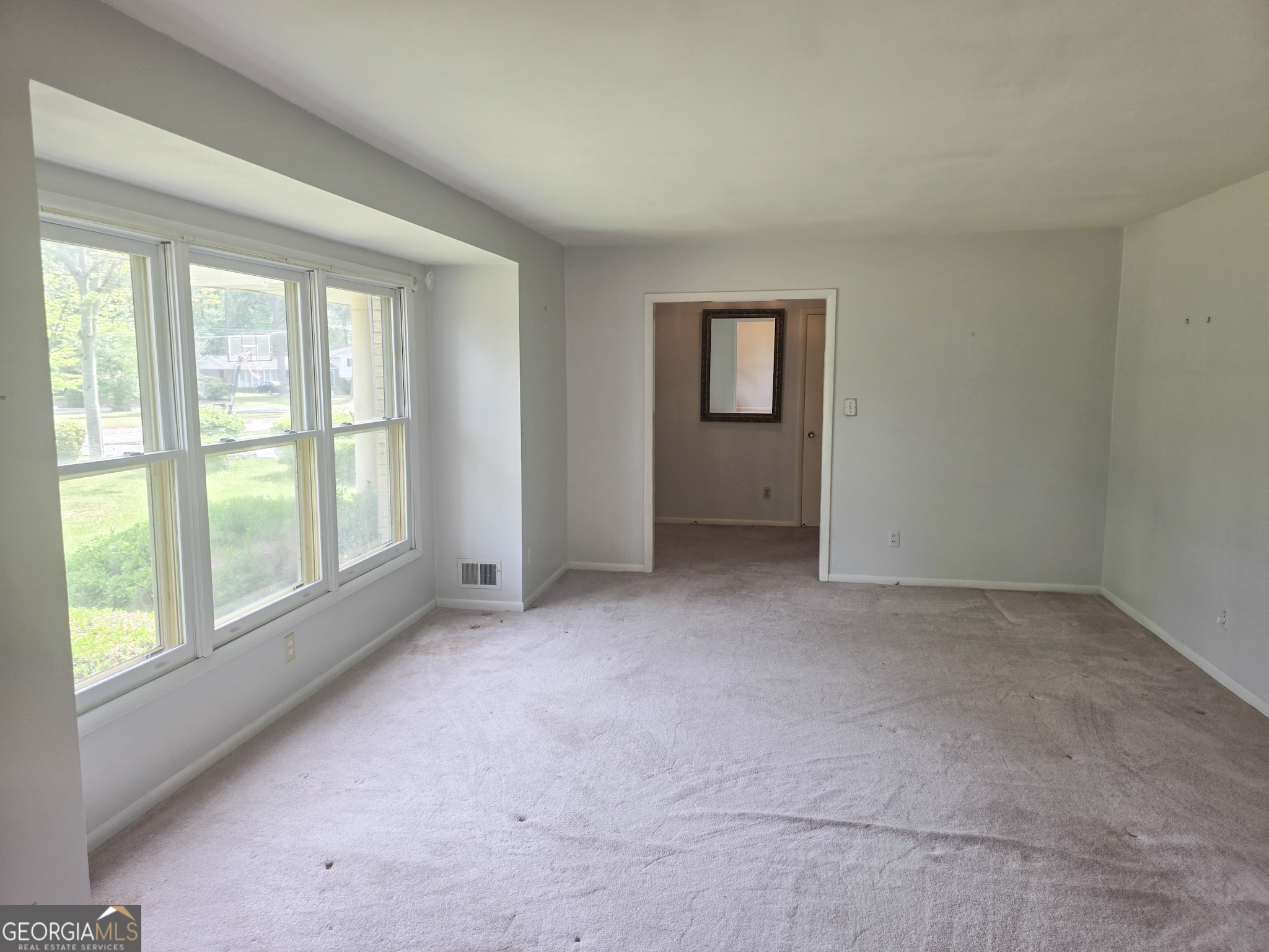 1712 Briarcliff Road Milledgeville, GA 31061 - Photo 27 of 44 an empty room with windows