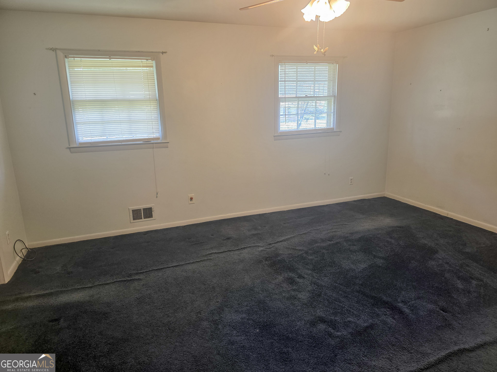 1712 Briarcliff Road Milledgeville, GA 31061 - Photo 32 of 44 an empty room with a window