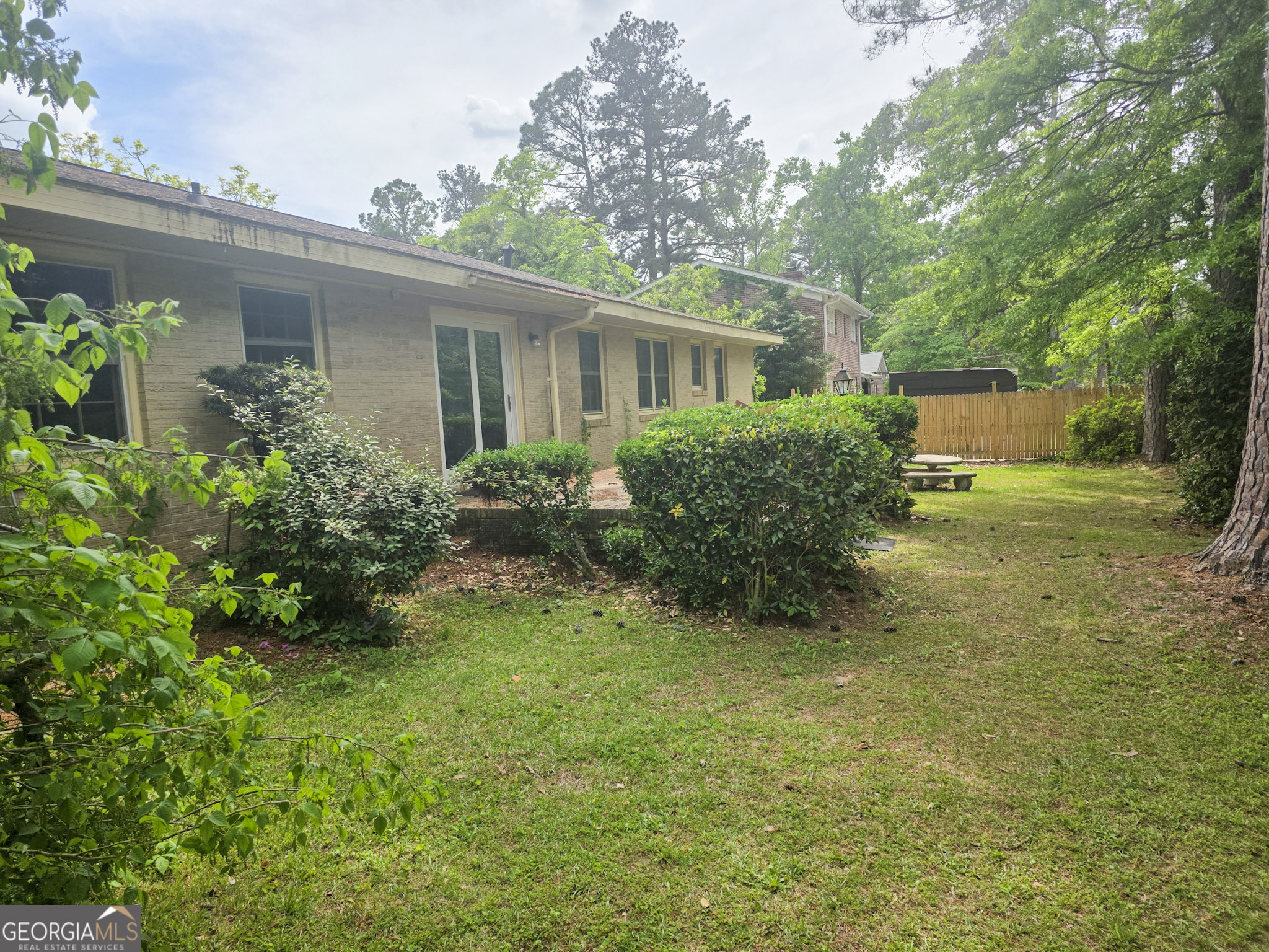 1712 Briarcliff Road Milledgeville, GA 31061 - Photo 7 of 44 a view of a house with a garden