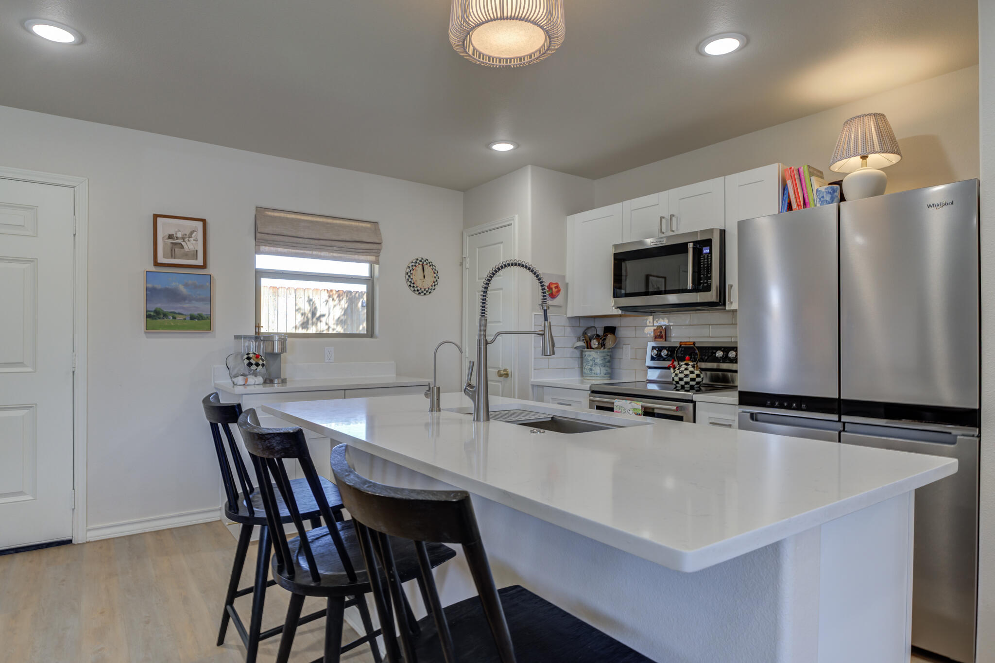 804 2nd Street Abernathy, TX 79311 - Photo 17 of 40 a kitchen with granite countertop a sink appliances and cabinets